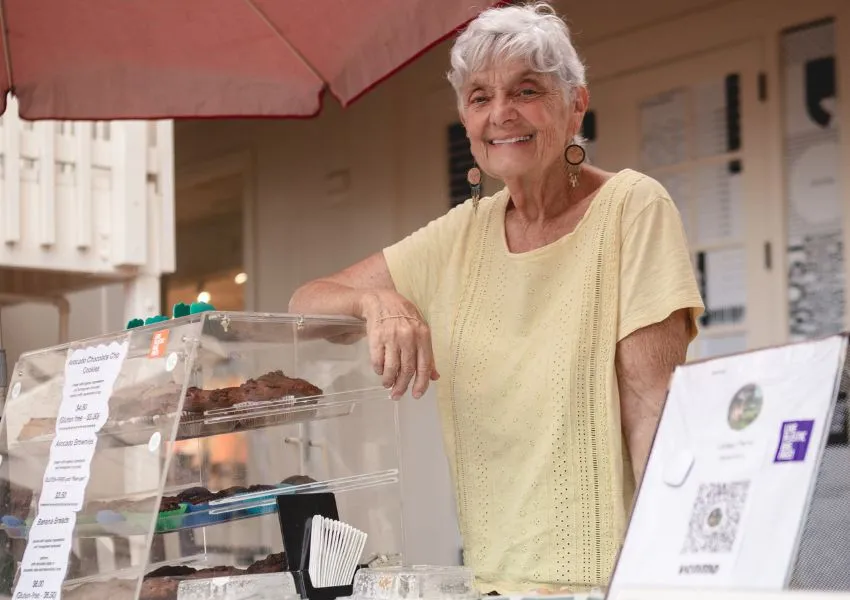 Vendor selling her baked goods